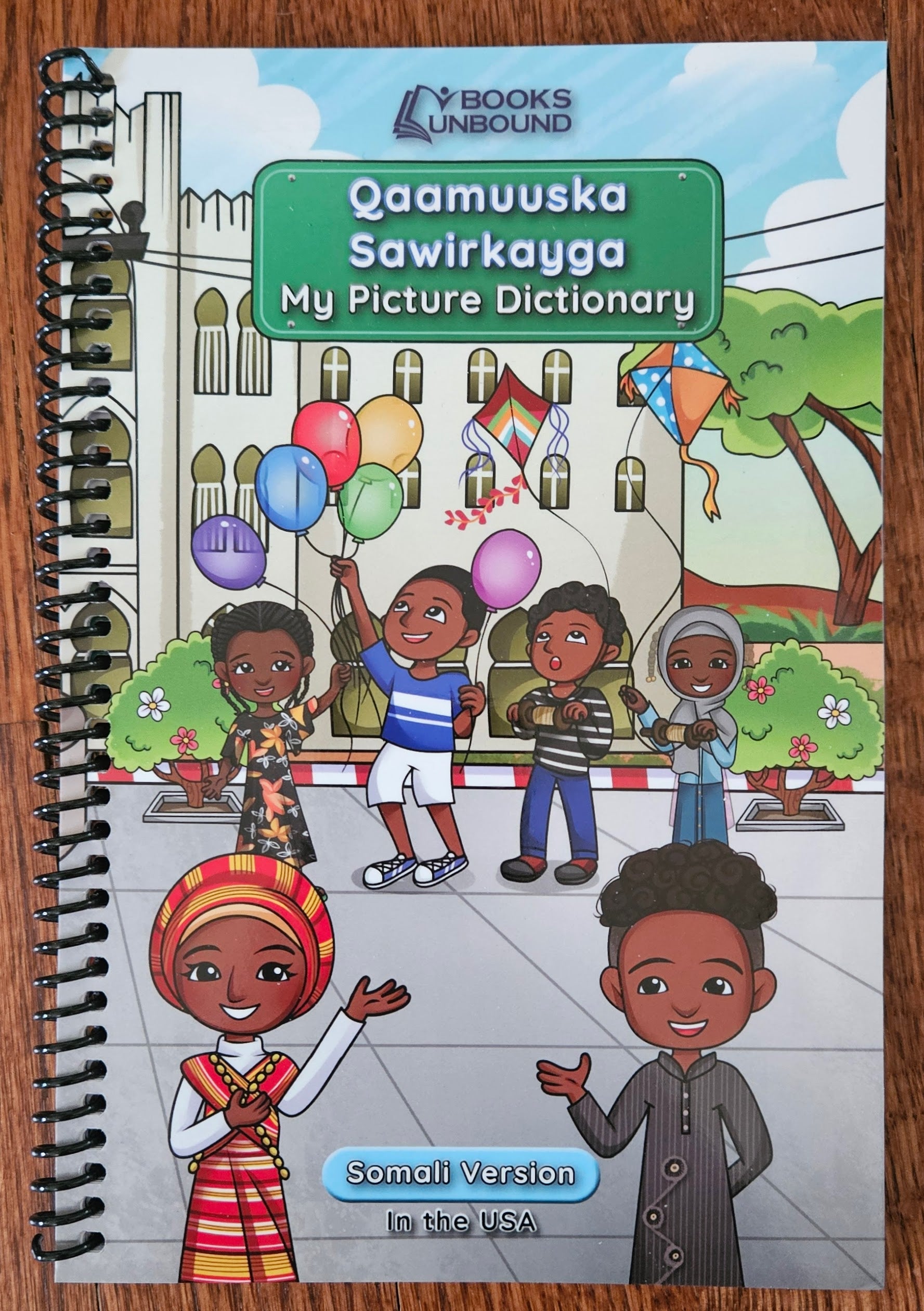 Somali Children's book titled 'My Picture Dictionary' with Somali cartoon characters